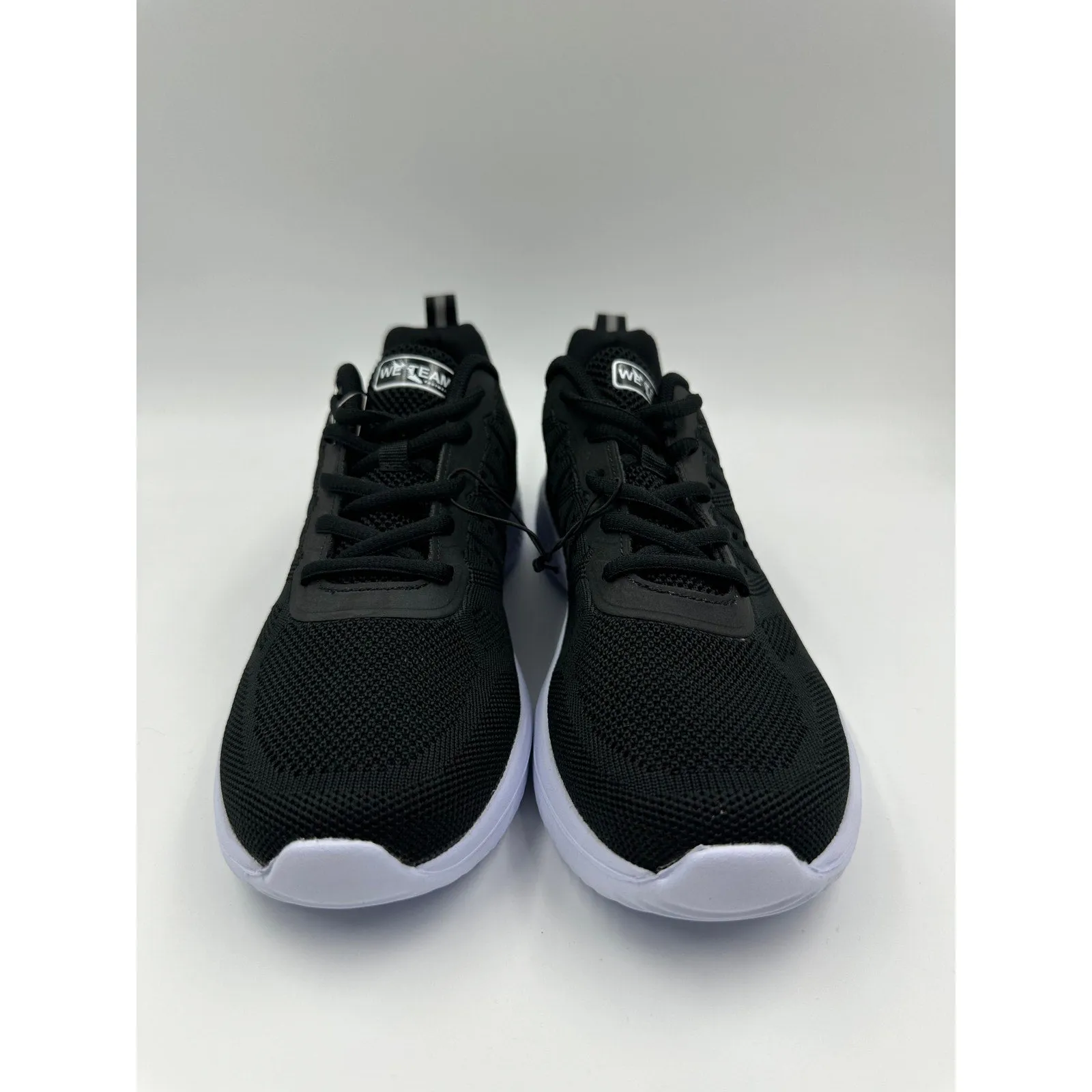 Men's Size 8.5 Black Sneakers with White Accents, Perfect for All Day Movement