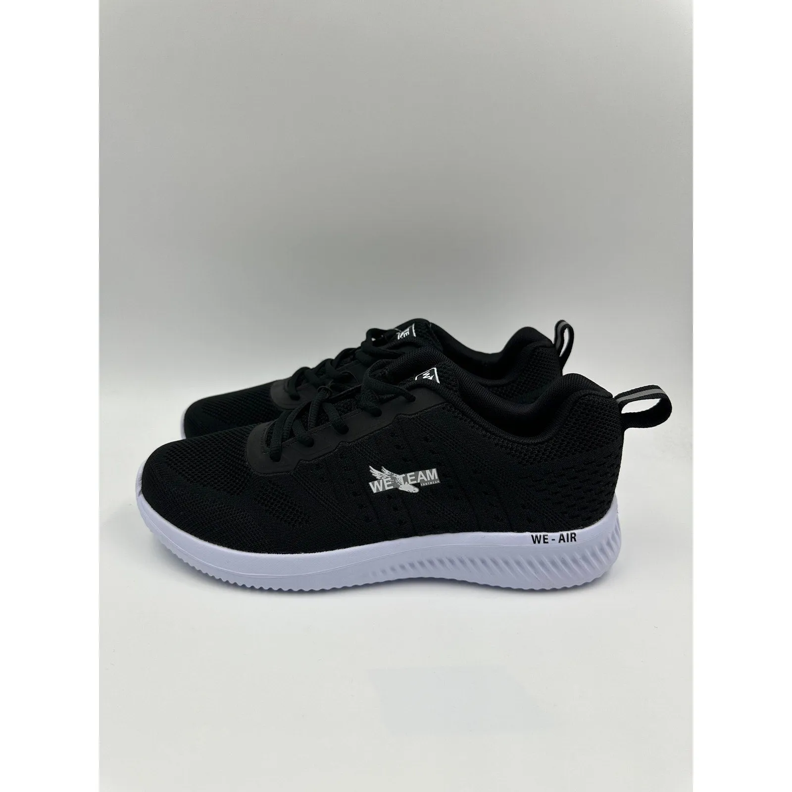 Men's Size 8.5 Black Sneakers with White Accents, Perfect for All Day Movement