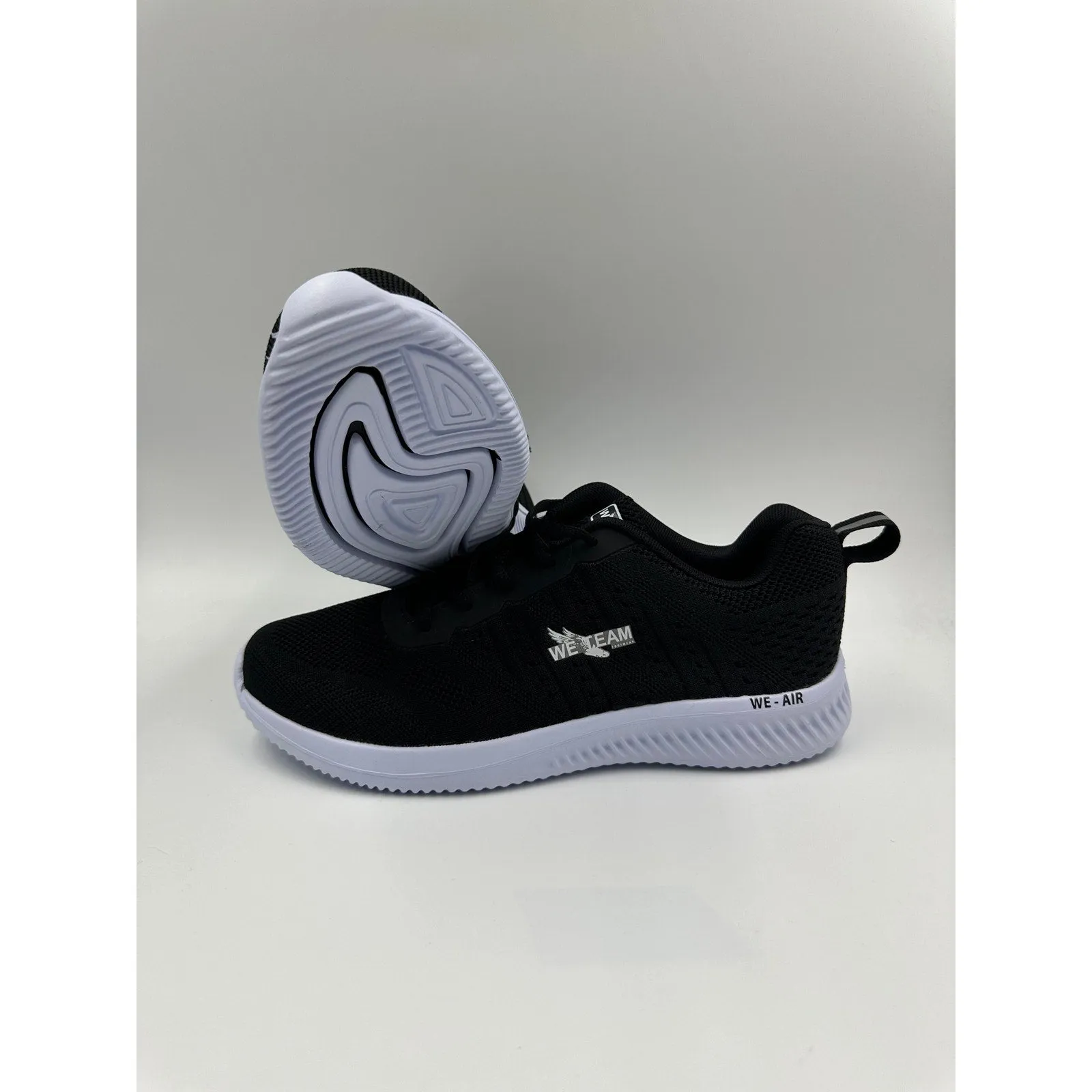 Men's Size 8.5 Black Sneakers with White Accents, Perfect for All Day Movement